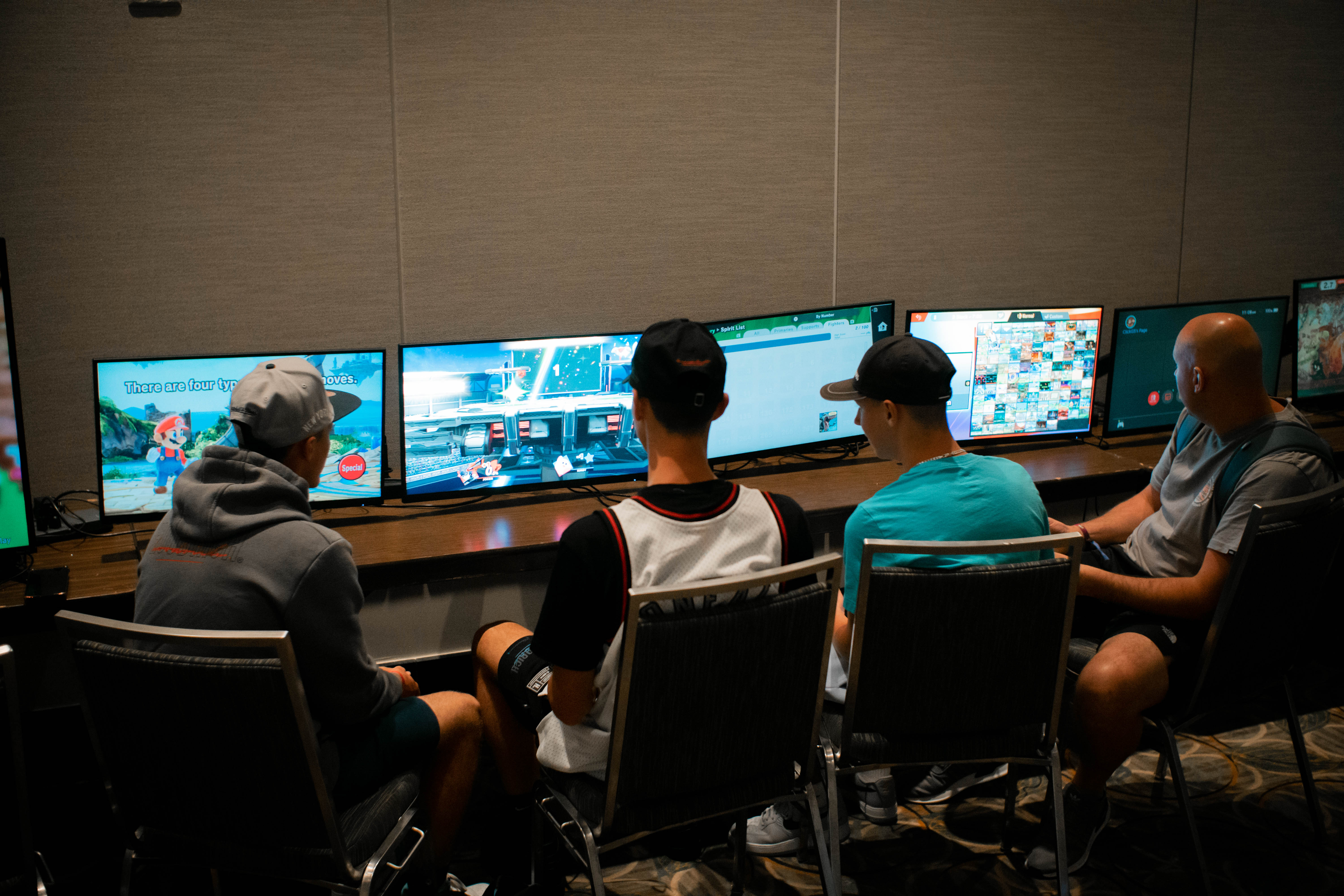 Gamers playing Super Smash Brothers at BattleCity Esports Orlando, FL