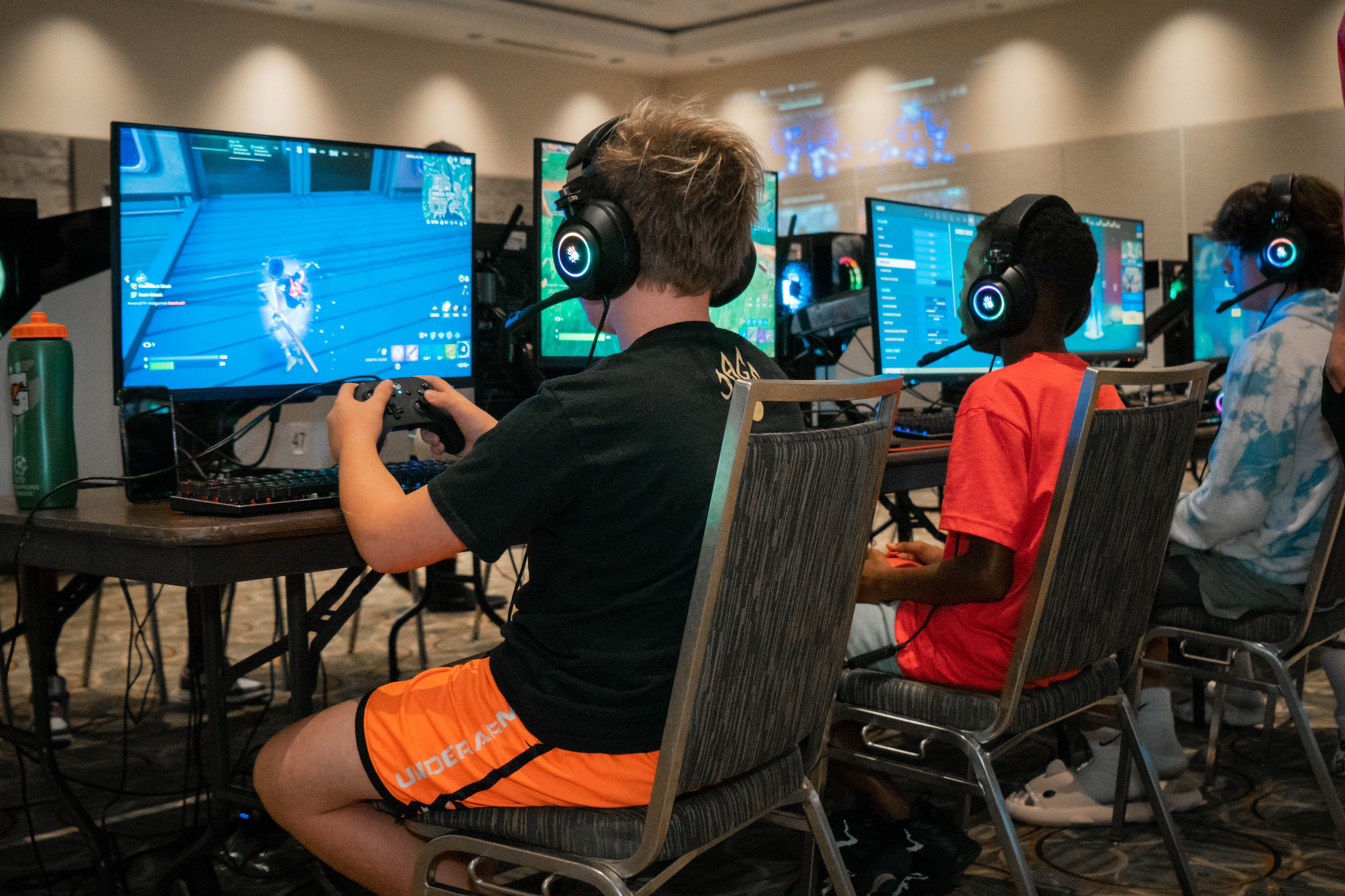 Children playing Fortnite at BattleCity Esports Orlando, FL