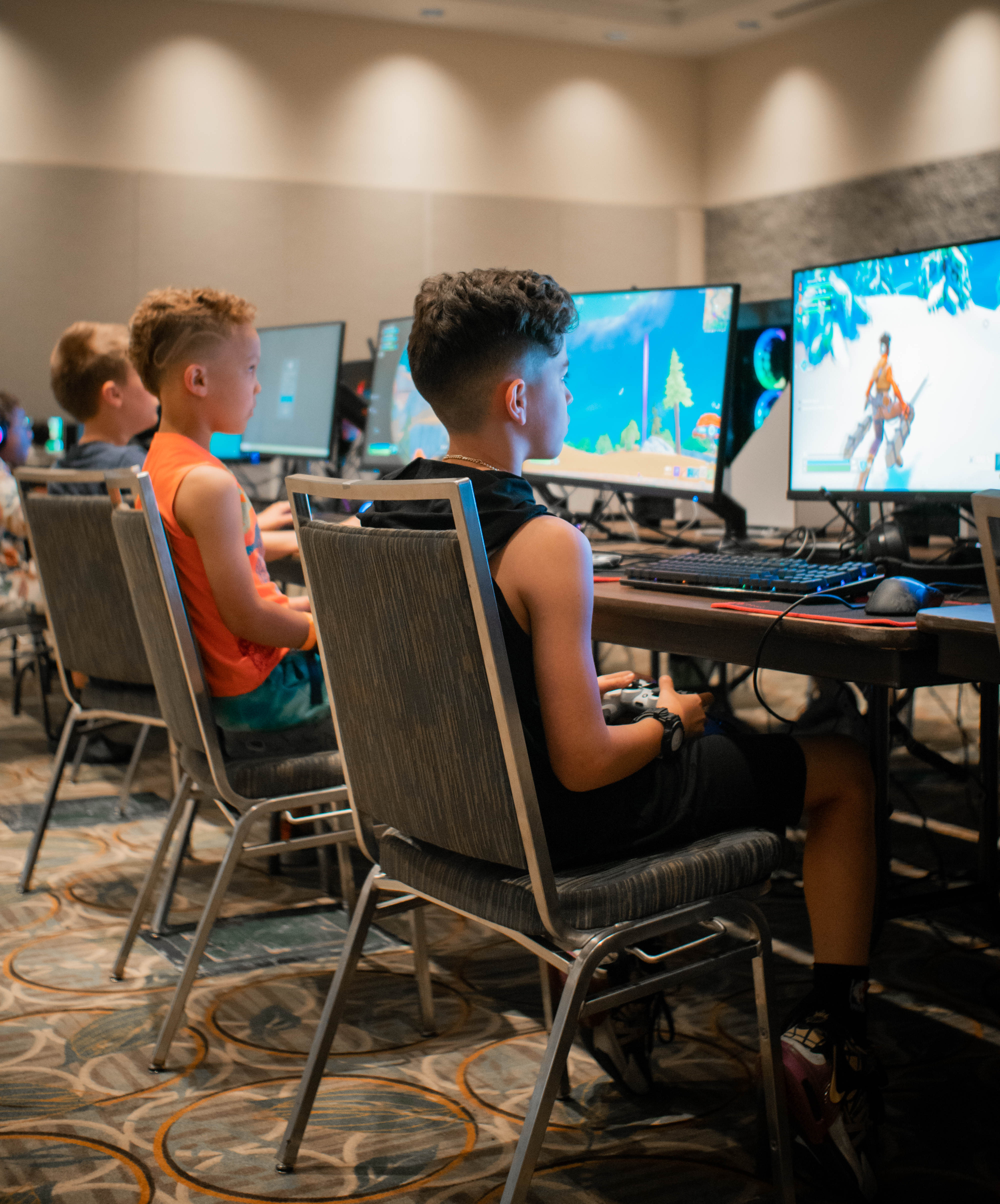 Children playing Fortnite at BattleCity Esports Orlando, FL