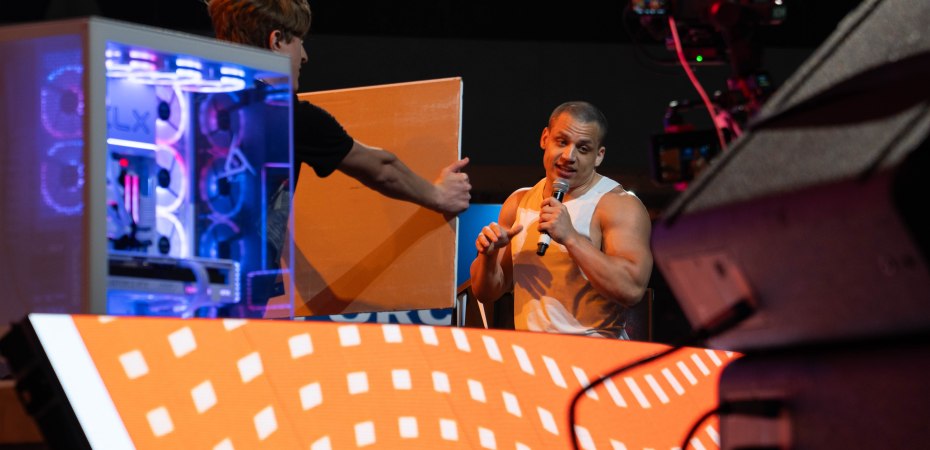Tyler "Tyler1" Steinkamp entertains a fan on top of The Pyramid at Dreamhack Dallas 2023.