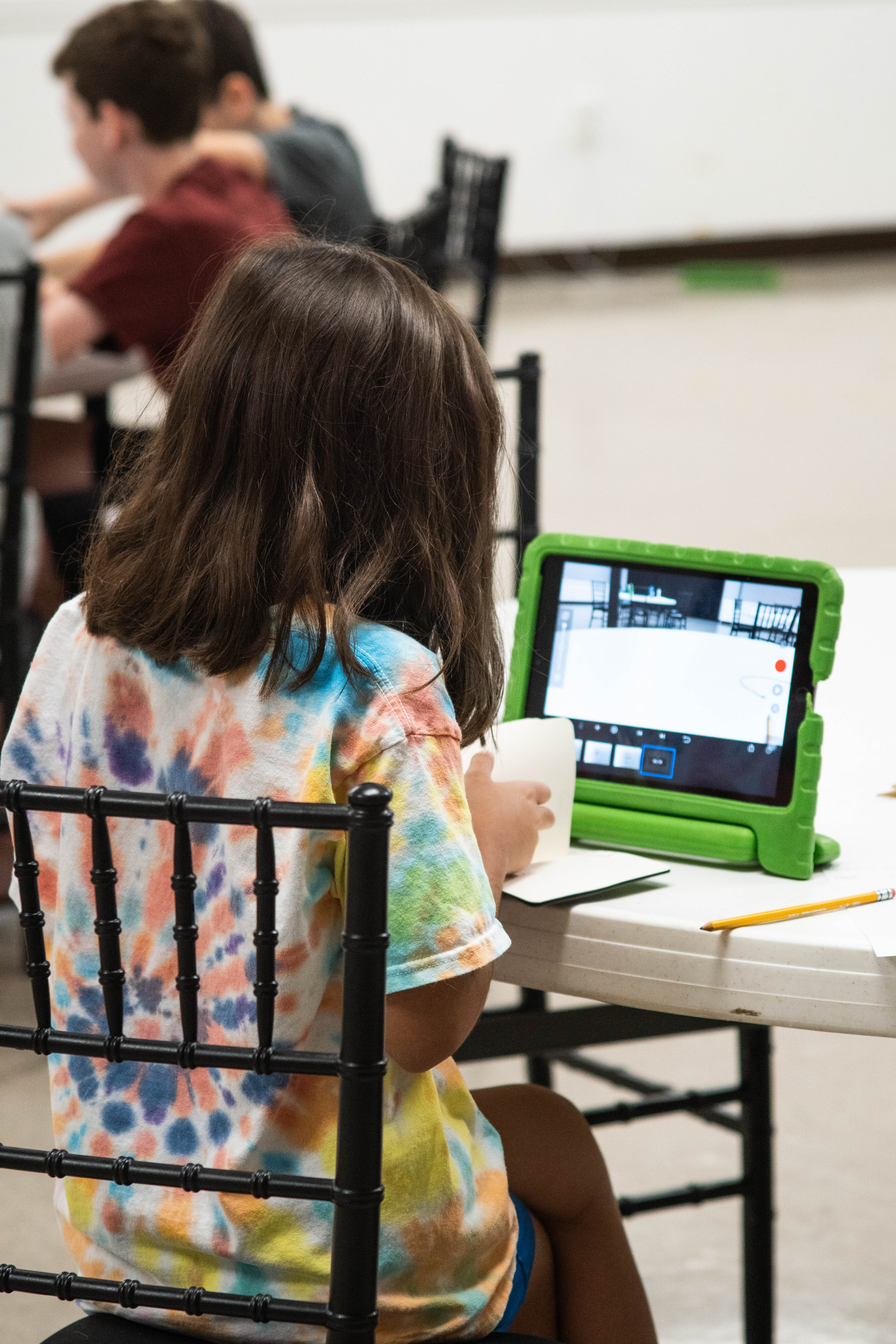 Techie Factory student looks over her notes. 