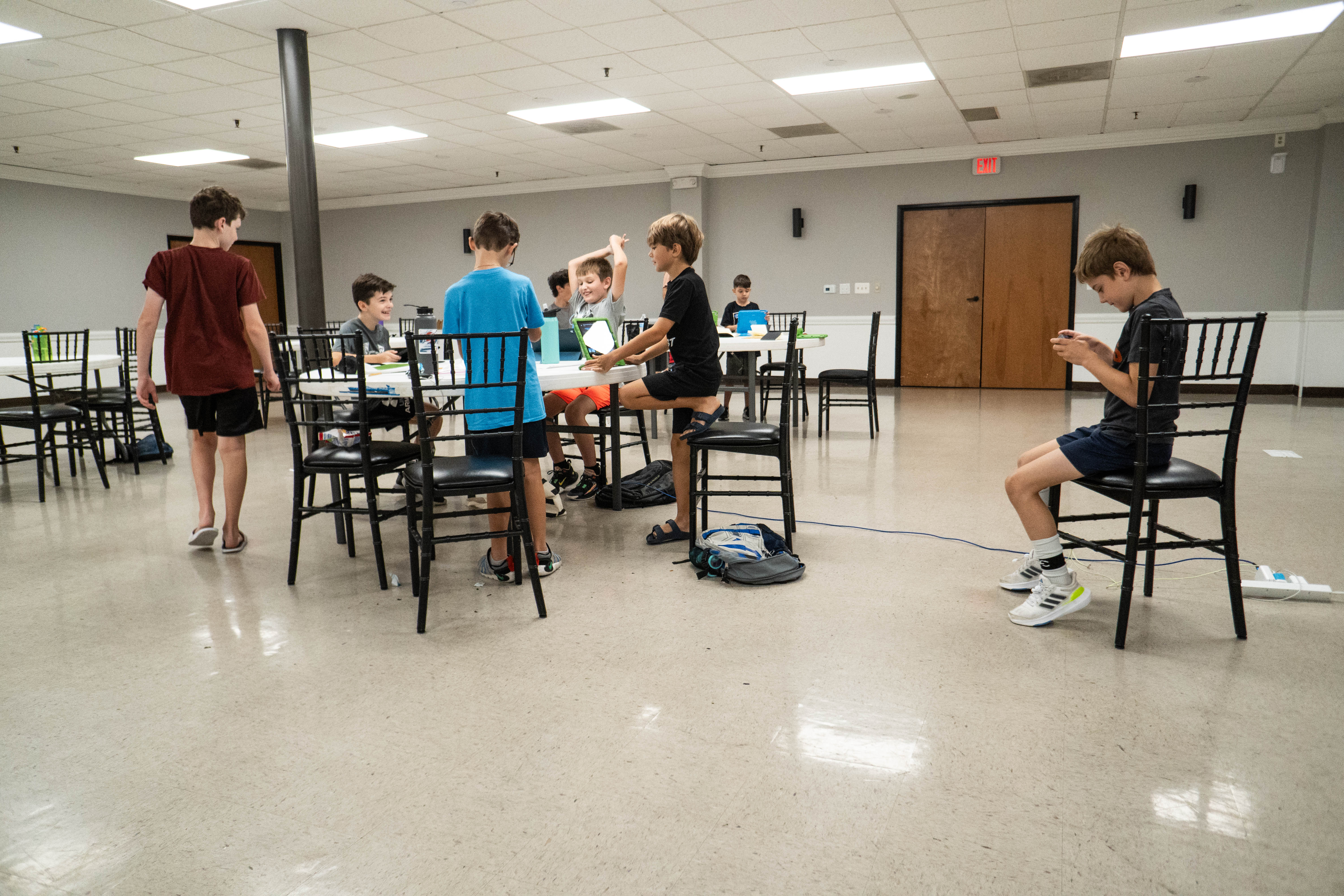 Techie Factory students starting to wrap up the first half of their day together by joking around and having fun. 