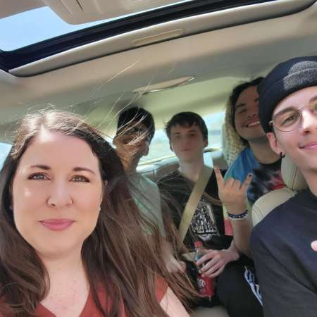 Vanessa "MommaToast" Kerr with her son Brandon aka ToasT (back middle) and his Super Smash Brothers friends. Photo Credit Vanessa Kerr