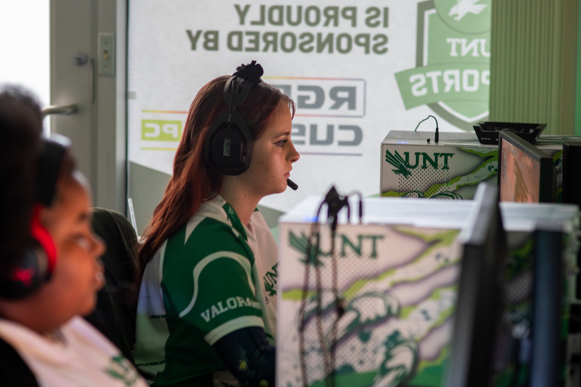 Shelby "Bab" Wolfe of the UNT Women's Valorant Team playing a competitive match in Denton, Texas. Photo Credit Rachel Olsen-Cooper